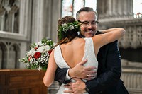 Father congratulating his daughter on her wedding day