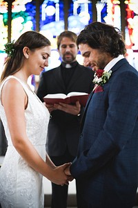 Bride and groom at the altar