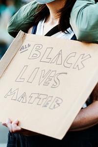 Woman fighting for justice at a black lives matter protest  