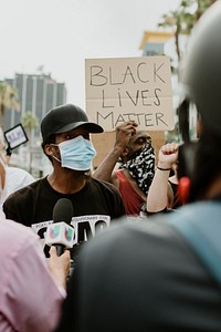 Protester being interviewed by a news channel during the Black Lives Matter protests in downtown Los Angeles. 8 JUL, 2020, LOS ANGELES, USA