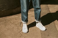 Man in blue jeans white high top sneakers mockup dark tone