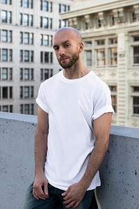 Casual white t-shirt mockup psd man in the city apparel shoot