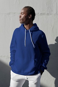 Man in dark blue hoodie streetwear men’s apparel fashion