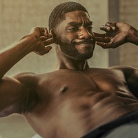 African American man doing sit-ups exercises