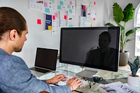 Businessman using a computer screen