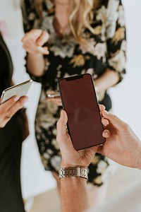 Closeup businessman using mobile phone