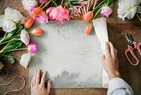 Wedding poster among colorful flowers