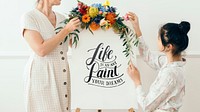 Mother and daughter decorating with flowers