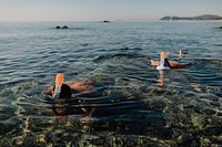 Men snorkeling in the sea