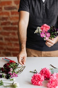 Man making a bouquet of flowers