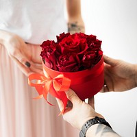 Boyfriend surprising his girlfriend with roses social ads template