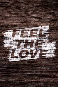 Feel the love printed lettering typography old wood texture