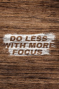 Do less with more focus text typography brown wood texture