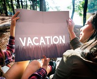Vacation word on nature background with trees