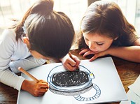 Child with a drawing of astronaut helmet