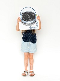 Child with a drawing of astronaut helmet