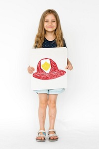 Child with a drawing of firefighter helmet