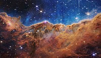 “Cosmic Cliffs” in the Carina Nebula from NASA’s James Webb Space Telescope (NIRCam Image)