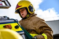 Female firefighter, March 6, 2019, Cheshire, UK. Original public domain image from Flickr