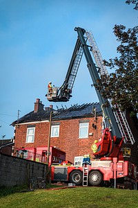 Fire truck with crane, July 24, 2019, Winsford, UK. Original public domain image from Flickr