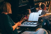 Woman playing xylophone, October 15, 2019, UK. Original public domain image from Flickr