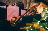 Musician playing trumpet. Original public domain image from Flickr