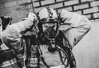 Firefighter wearing protective mask, December 14, 2020, Cheshire, UK. Original public domain image from Flickr