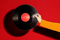 Music background, woman holding a vinyl record