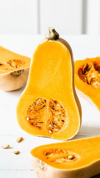Butternut squash on wooden table mobile phone wallpaper