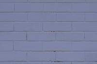 Purple textured brick wall background