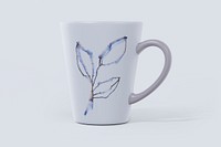 Ceramic coffee mug mockup, leafy design psd