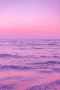 Pink dreamy beach background, nature aesthetic