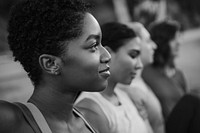 Female athletics stretching, black and white photo