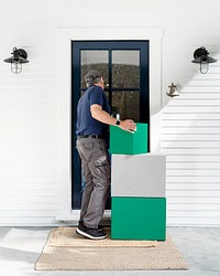 Delivery man at doorstep, logistics photo