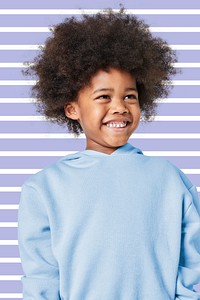 Black boy in blue sweater studio shot