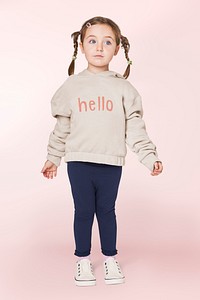 Little girl with braid in a studio