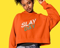 Trendy orange hoodie psd mockup with Slay The Day quote street fashion