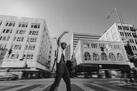 Urban fashion, African American man crossing road photo