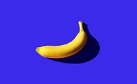 Ripe banana on blue background