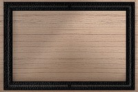 Black leather frame on wooden background vector