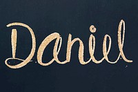 Cursive gold Daniel name vector font typography