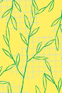 Green leaf pattern on yellow grid background