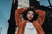 Beautiful woman in brown coat, fashion portrait