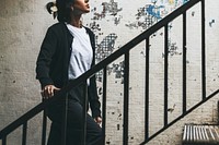 Woman walking up the stairs