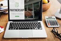 Partnership word on business handshake background