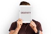 Creativity word tablet on face