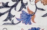 Panel of slightly conventionalized leaves and flowers embroidered on heavy cotton. Several parts of the design are outlined in machine chain stitch with red. The anhiline dyes have run and stained the material.. Original from the Minneapolis Institute of Art.