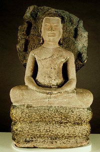 Buddha, figure of, seated on coils of a snake and sheltered by his seven expanded hoods. Monastic garment covers the figure (greatly weathered) leaving right shoulder bare; pendant ears, without jewelry. The Usnisa, or flame, is cone shaped; the hair is apparently plaited. The figure and serpent were originally ornamented with gilding, some of which remains, especially on coils of serpent and rear of his expanded heads. The serpent is in three coils. Provenance Angkor region.. Original from the Minneapolis Institute of Art.
