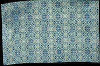 Panel of brocade with a diapered ground enriched with floral motifs. Colors chiefly blue and green, with pink, red, and yellow in the details. A modern copy of a Ming fabric. Lining of gold-colored damask in cloud design.. Original from the Minneapolis Institute of Art.