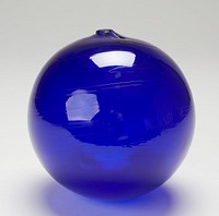 ball, blue colored glass; measured on stand (should it be numbered'b'?) cat. card dims H 6 x diam 6'. Original from the Minneapolis Institute of Art.